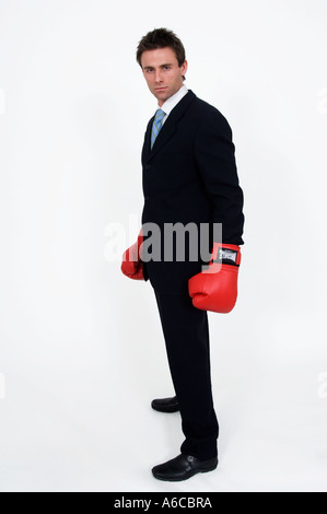 Businessman avec des gants de boxe Boxing clever la gestion de la colère Banque D'Images