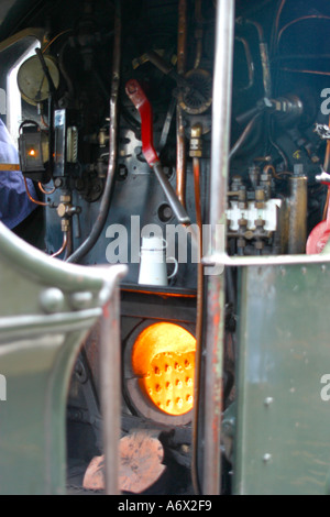 Marche pieds moteur train à vapeur Banque D'Images