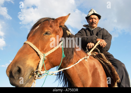 Herder kirghize assis sur l Banque D'Images