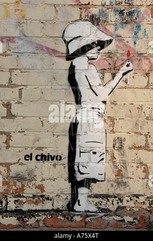 El Chivo Graffiti Art Boy et de Gravure Style Banksy Bateau Banque D'Images