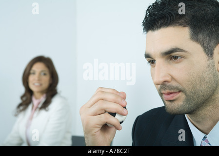 Businessman holding stress Banque D'Images