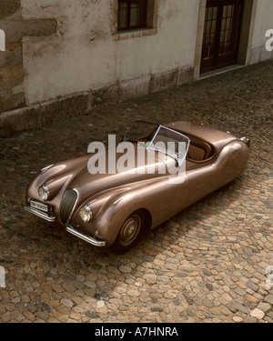 Jaguar XK 120 OTS (1950) Corps allié sur la rue pavée en Suisse Banque D'Images