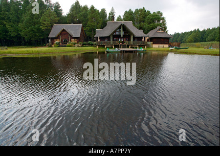 Lakenvlei Lodge, près de Dullstroom situé sur les rives de la vaste zone humide qui est un lieu de pêche la truite et l'achigan Banque D'Images