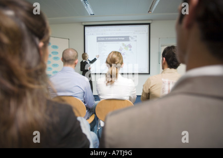 Businesswoman giving presentation Banque D'Images