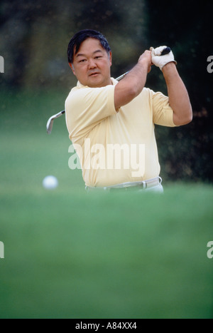 Man playing golf. Banque D'Images