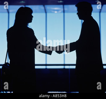 Vue côté intérieur silhouette de l'homme et la femme d'accueil poignée. Banque D'Images