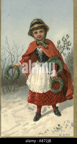 Carte de vœux de Noël d'enfant qui vend des guirlandes vert vers 1875 Banque D'Images