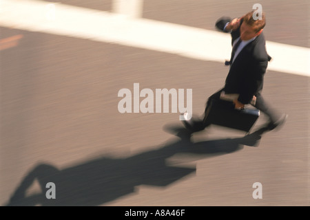 Businessman with briefcase en concordance Banque D'Images