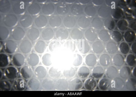 Soleil À TRAVERS LE PLASTIQUE Banque D'Images