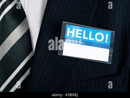 Namebadge dire bonjour sur un homme bien habillé d'insérer votre propre information Banque D'Images