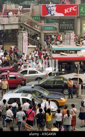 La Chine, Beijing. Commerçant dans le district Xicheng Xidan Banque D'Images