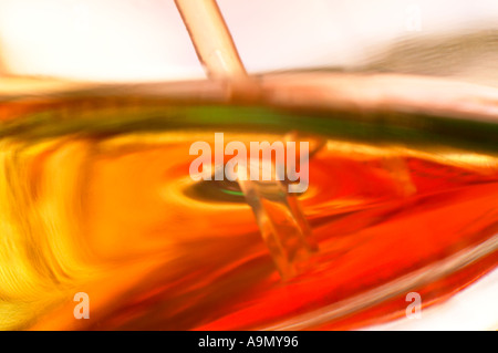 Close up of swirling verre rouge Banque D'Images