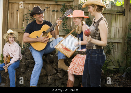 Groupe de musique country de la famille Banque D'Images