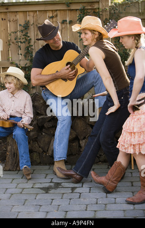 Jeu de famille pays de la musique et de la danse Banque D'Images