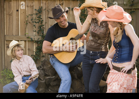 Jeu de famille pays de la musique et de la danse Banque D'Images