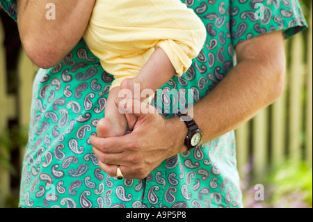 Père holding baby girl Banque D'Images