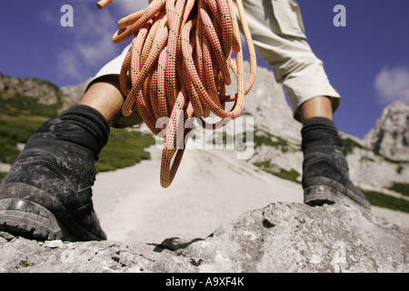 Climber avec corde Banque D'Images