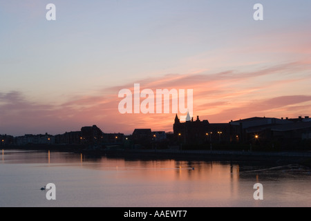 Le lever du soleil sur le lac marin Southport merseyside uk Banque D'Images