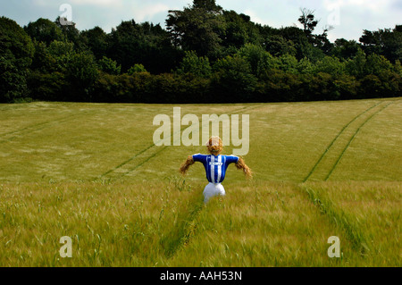 Un épouvantail habillé de Brighton et Hove Albion Football Club strip sur l'emplacement de nouveau stade dans la région de Brighton and Hove Banque D'Images