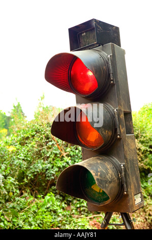 Travaux routiers temporaires des feux de circulation sur red UK Banque D'Images