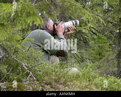 Photographe de la nature dans le sous-étage Banque D'Images