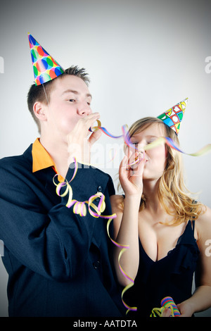 Young couple having fun at a party Banque D'Images