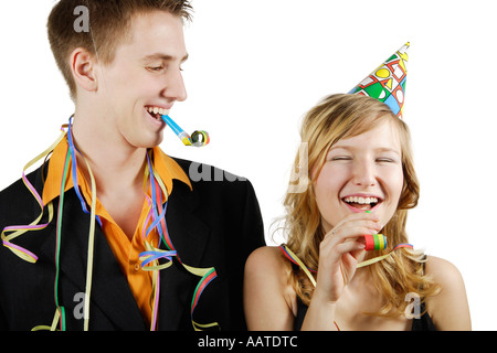 Young couple having fun at a party Banque D'Images