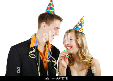 Young couple having fun at a party Banque D'Images