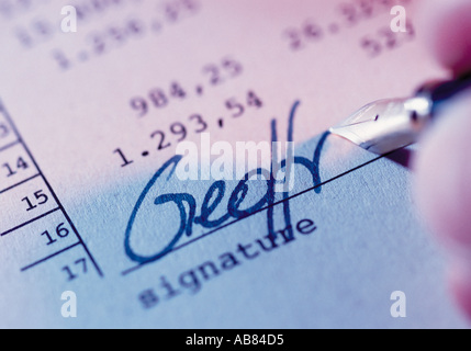 Signature sur un document Banque D'Images