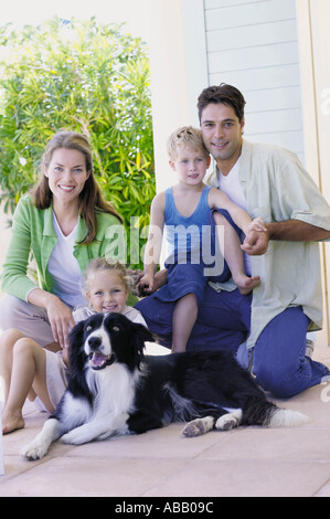 Famille avec un Colley chien Banque D'Images