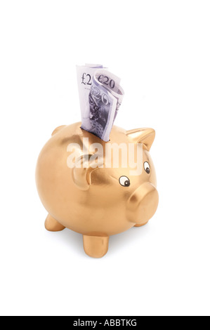 Golden piggy bank avec notes de 20 livres Banque D'Images