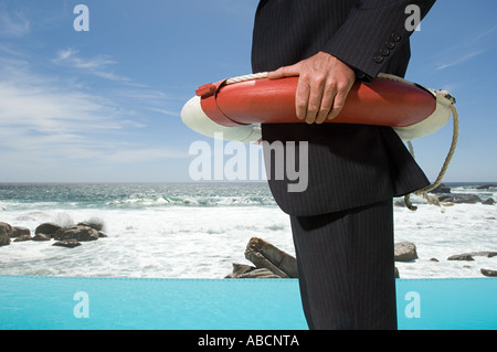 Businessman wearing une bouée Banque D'Images