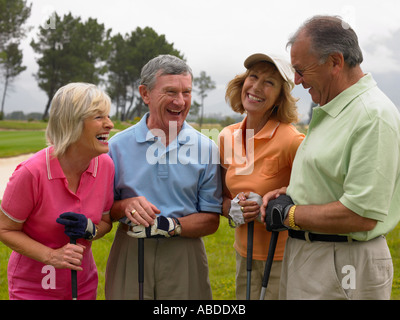 Les golfeurs de rire Banque D'Images