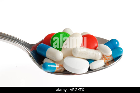 Pills on a spoon Banque D'Images