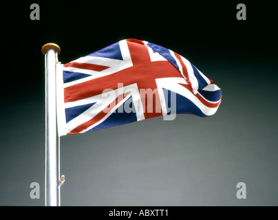 Union Jack flag flying sur un mât Banque D'Images