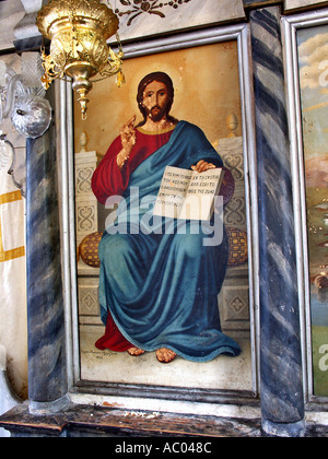 Jésus holding book Je suis la lumière du monde illustration murale ancienne église des sentiers à Tissiniva Crete island Grèce Banque D'Images