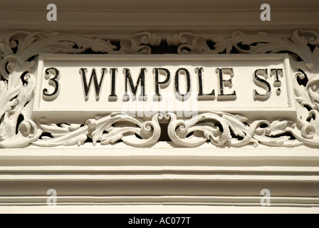 Ornate old white stone signe pour 3 Wimpole Street London England Banque D'Images