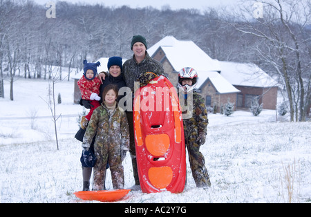 Famille dans la neige Banque D'Images