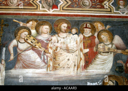 Détail de la spectaculaire 14e siècle peintures murales dans la chapelle de Saint Nicolas de Tolentino, le Marches Italie. Banque D'Images