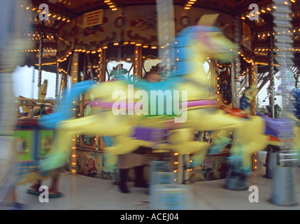 Sur un carrousel de chevaux Banque D'Images