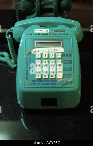 Charmant, mélo, vieux, vert, téléphone utilisé à la réception de l'hôtel. Suzhou, Chine. Banque D'Images