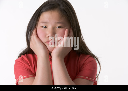 Portrait d'une jeune Chinoise triste Banque D'Images