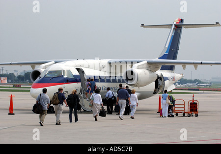 Les passagers d'un avion Banque D'Images