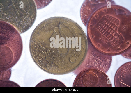 Pièces de monnaie dans la glace Banque D'Images