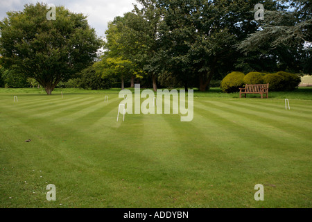 Pelouse anglaise de Croquet à West Dean Gardens, West Sussex, Angleterre, Royaume-Uni Banque D'Images