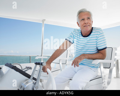 Middle-aged man sitting at Banque D'Images
