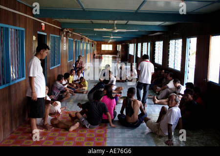 Célébration de Gawai Dayak et rituel à Rumah Engking, un Iban Longhouse traditionnelle, Kuching, Sarawak, Bornéo, Malaisie Banque D'Images