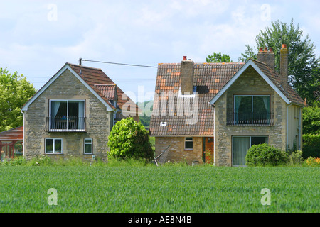 Cottages récemment construit dans le village de Lacock, carte postale Banque D'Images