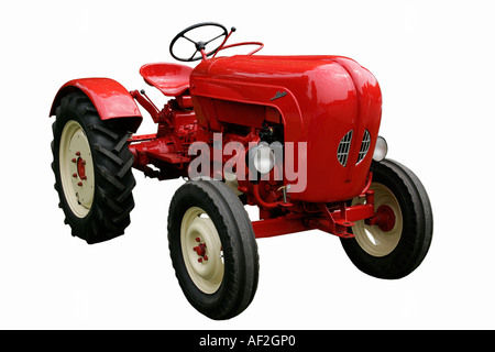 Porsche rouge tracteur agricole Agriculture agriculture semis de printemps d'été emploi travail terre profession agriculteur mature tournesol, Helianthus Banque D'Images