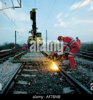 L'équipe d'entretien de la voie ferroviaire de soudage section. Banque D'Images